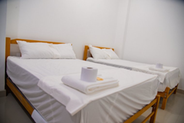 Habitación con dos camas para familias o grupos en Tumbes